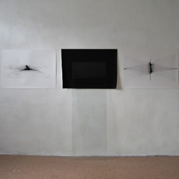 "Strutturare i propri pensieri partendo da uno stato di zero assoluto", 2011, ink on paper (cm.60x80 each), glass,cm170x44